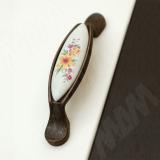 Ручка-скоба 96мм бронза патинированная/керамика мат. лилия M16.02.113.01, фото 1